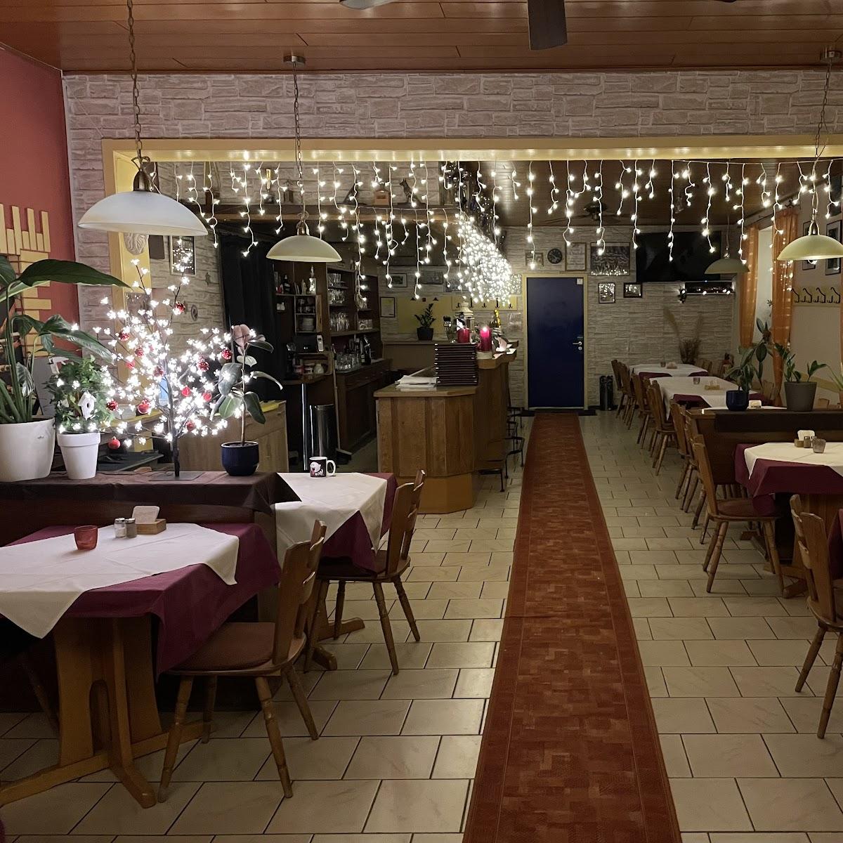 Restaurant "VfL-Gaststätte  Symposio " in Neuhofen