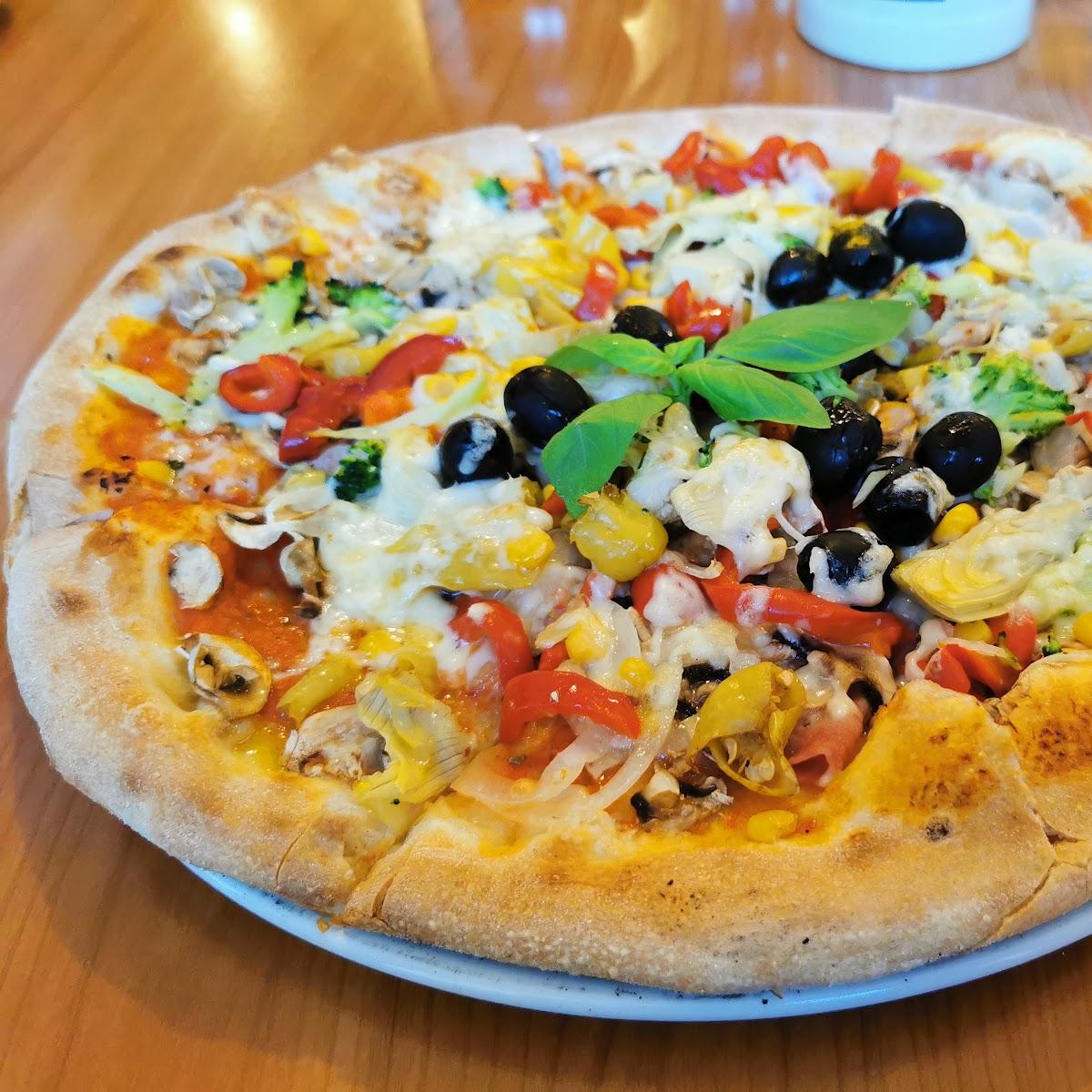 Restaurant "La Perla Ristorante Pizzeria" in Train