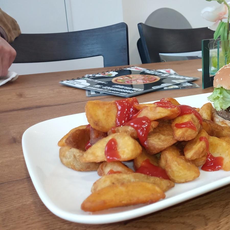 Restaurant "Pizza and More" in Kall