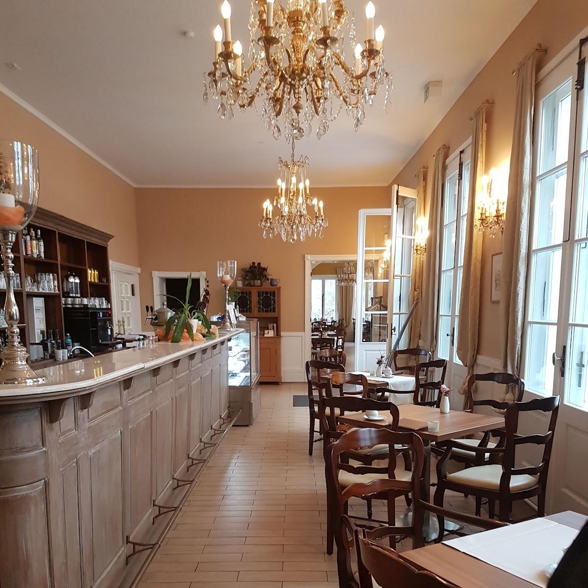 Restaurant "Rosencafé , Raulff - Hotels" in Putbus
